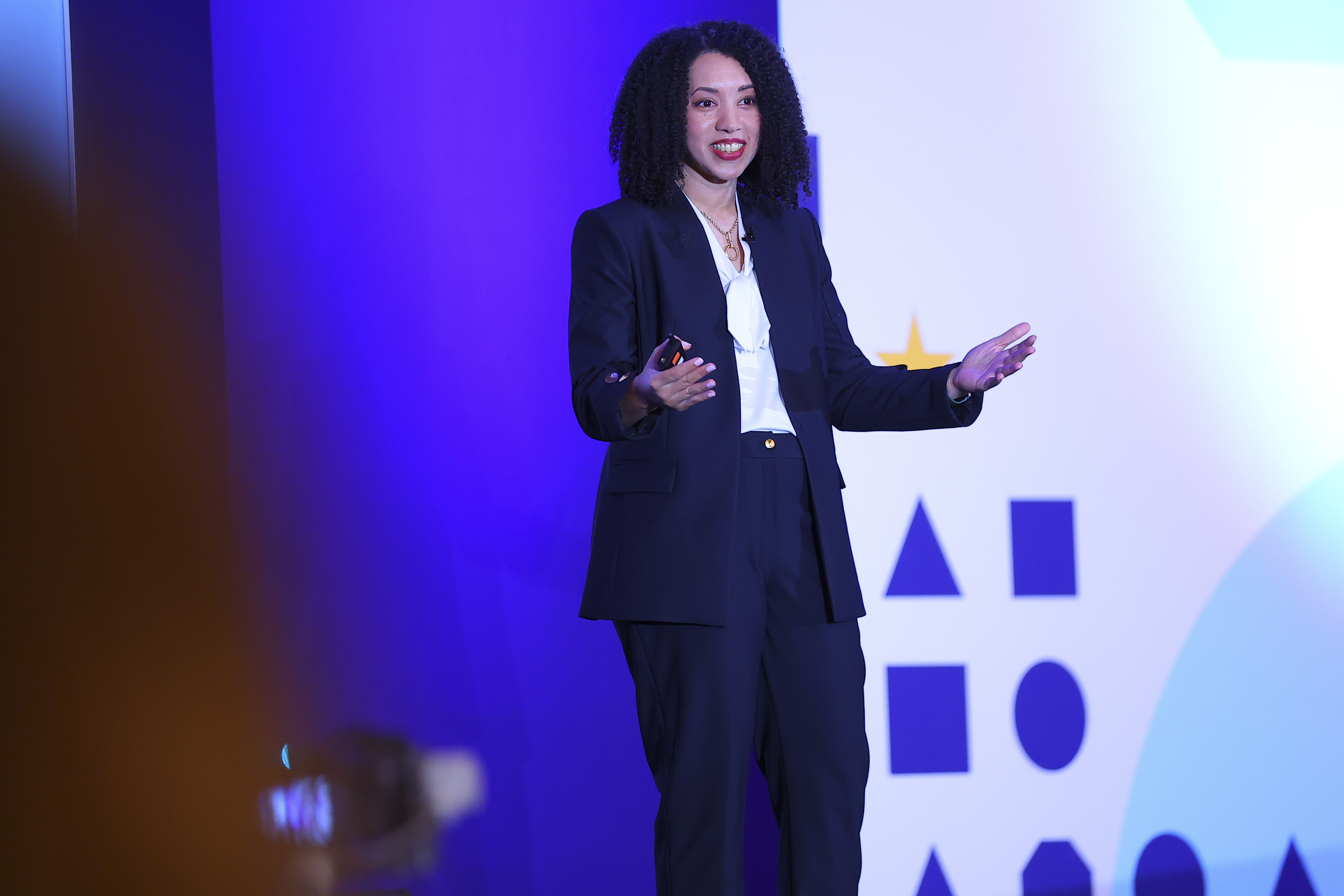 Executive speaker presenting at forum